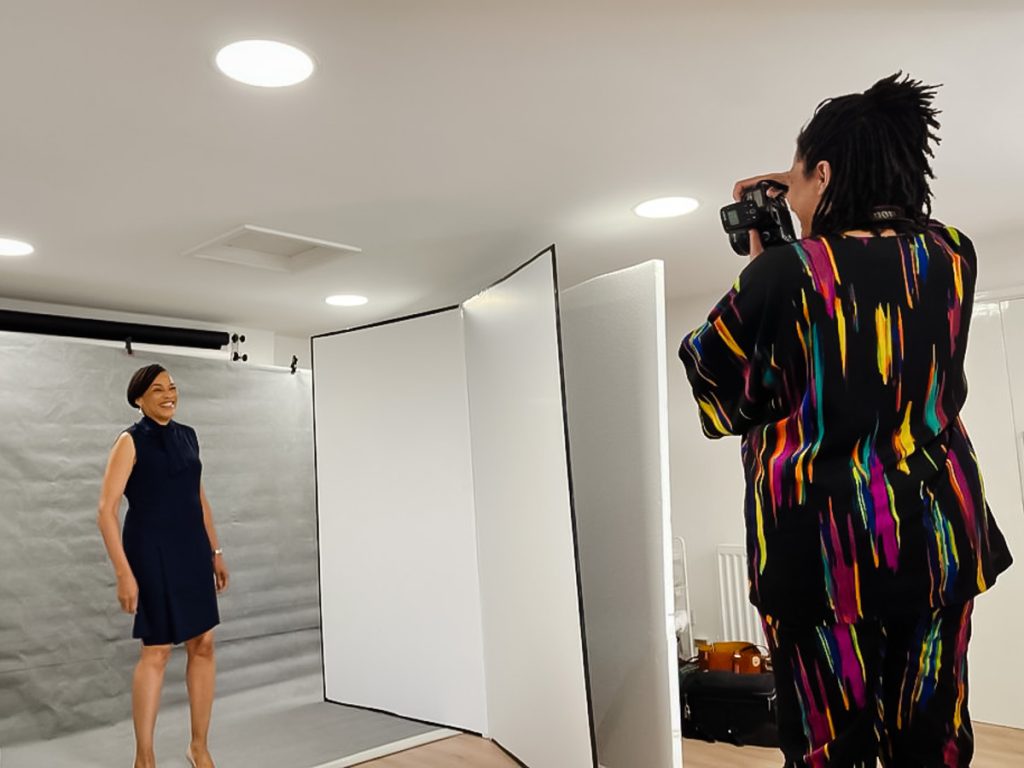 What happens at a photoshoot - Woman being guided through poses at a luxury photoshoot in Milton Keynes