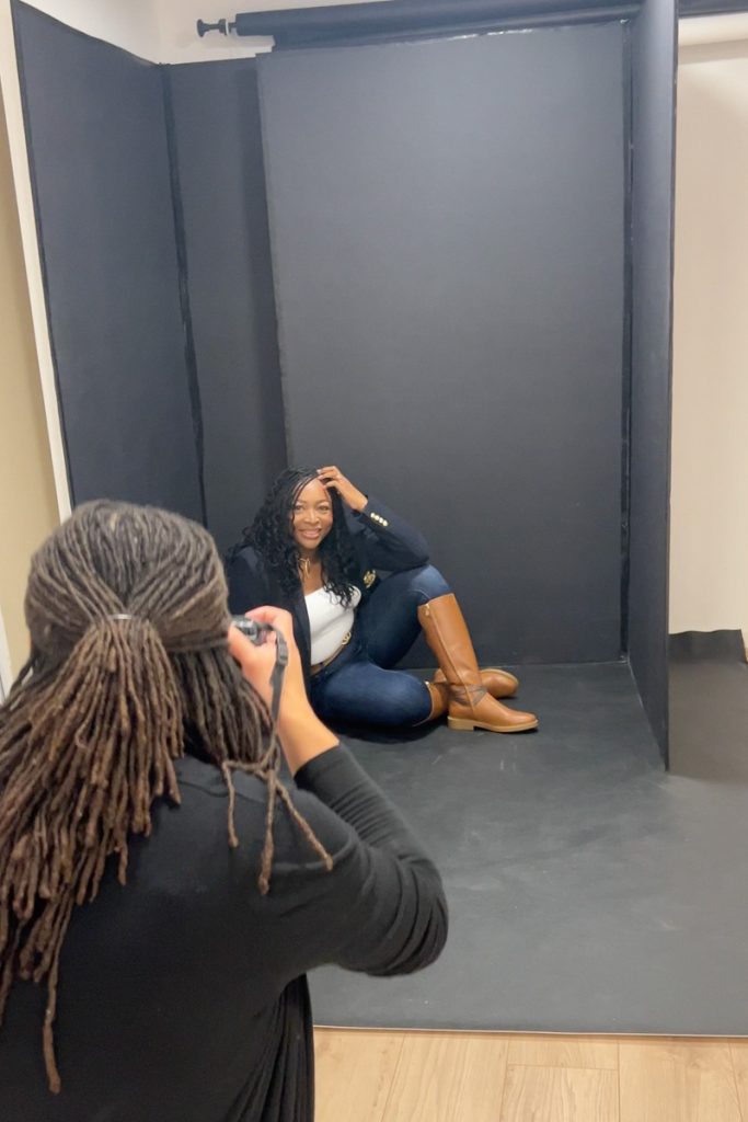 Woman being guided through poses at photoshoot in Milton Keynes studio