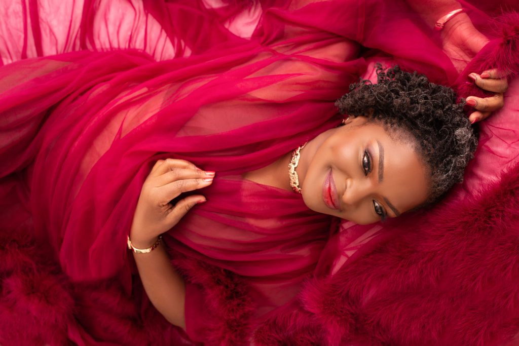 Confident woman at a luxury portrait session after delaying her photoshoot