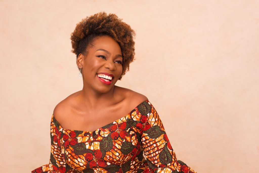 Why women delay photoshoots - confident woman at luxury photoshoot 